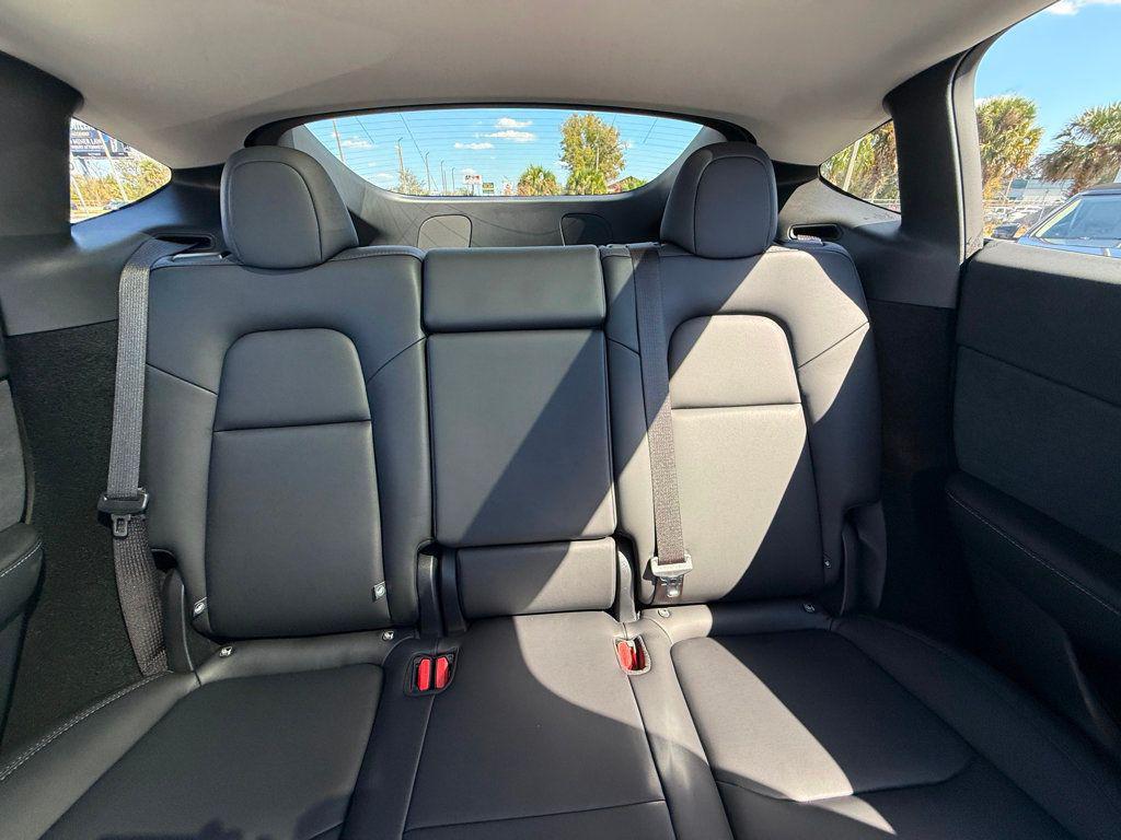 used 2025 Tesla Model Y car, priced at $41,991