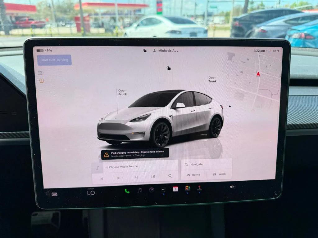 used 2024 Tesla Model Y car, priced at $35,691
