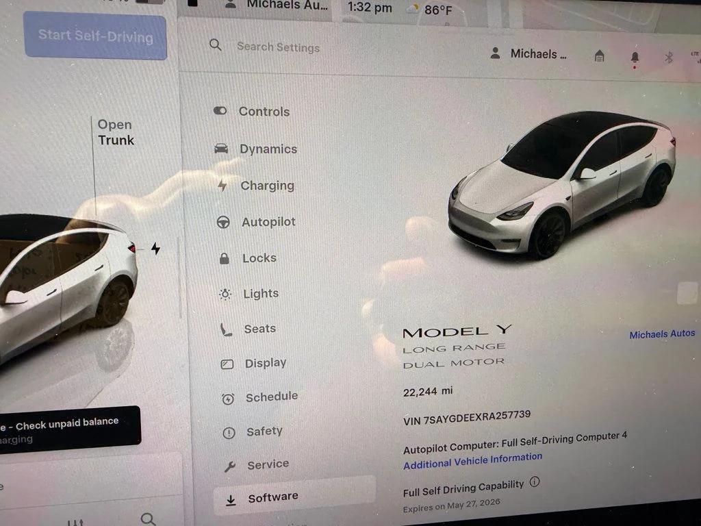 used 2024 Tesla Model Y car, priced at $35,691