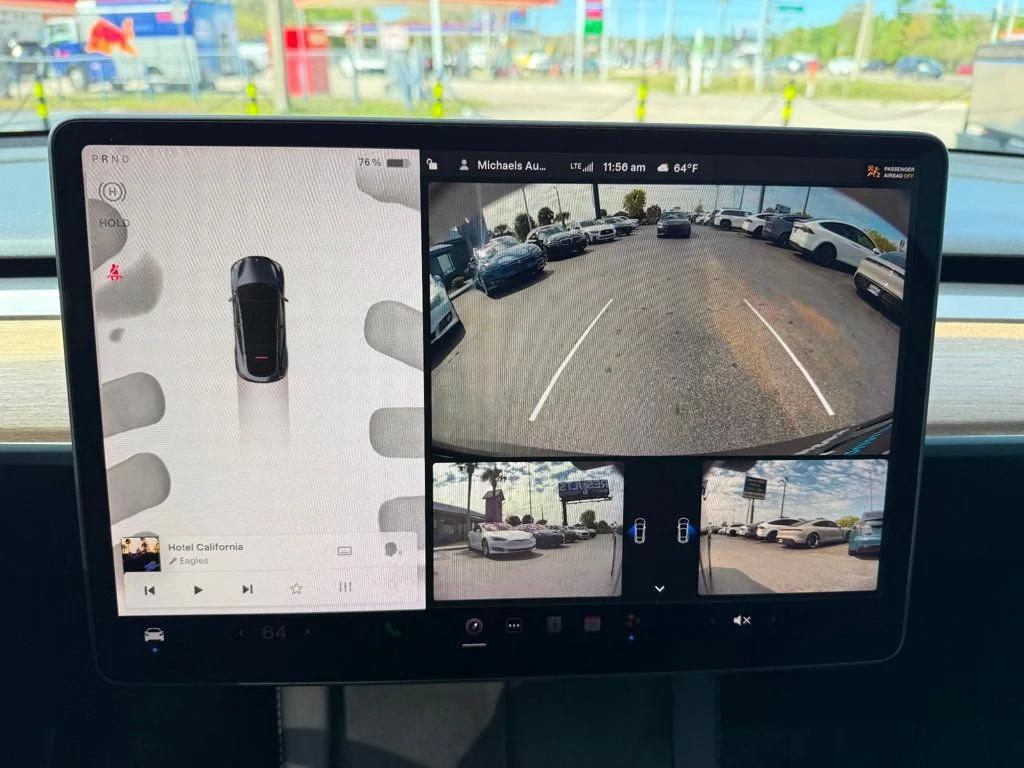 used 2023 Tesla Model Y car, priced at $34,991