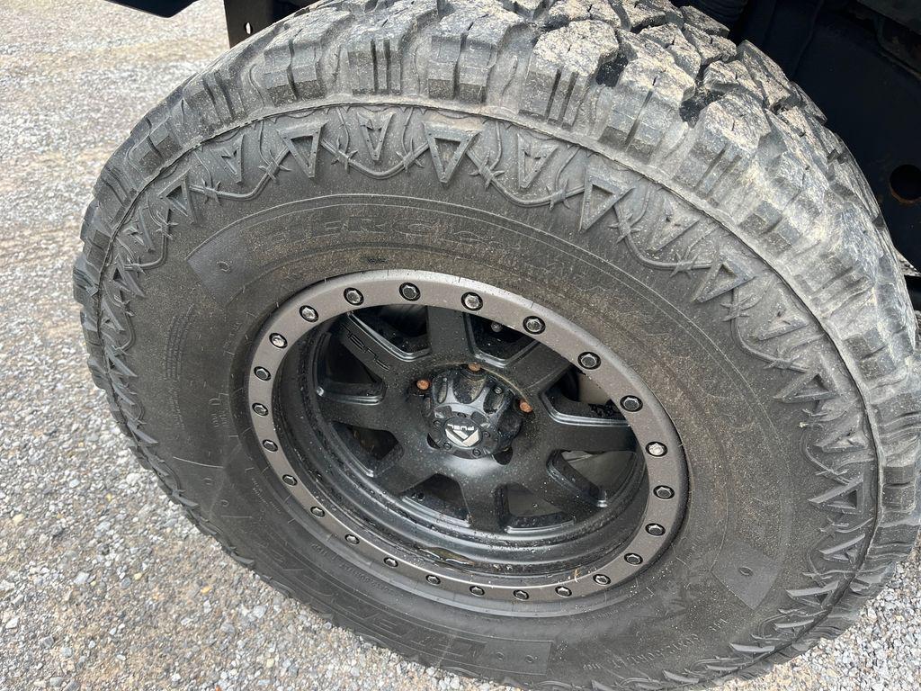 used 2014 Jeep Wrangler Unlimited car, priced at $21,677