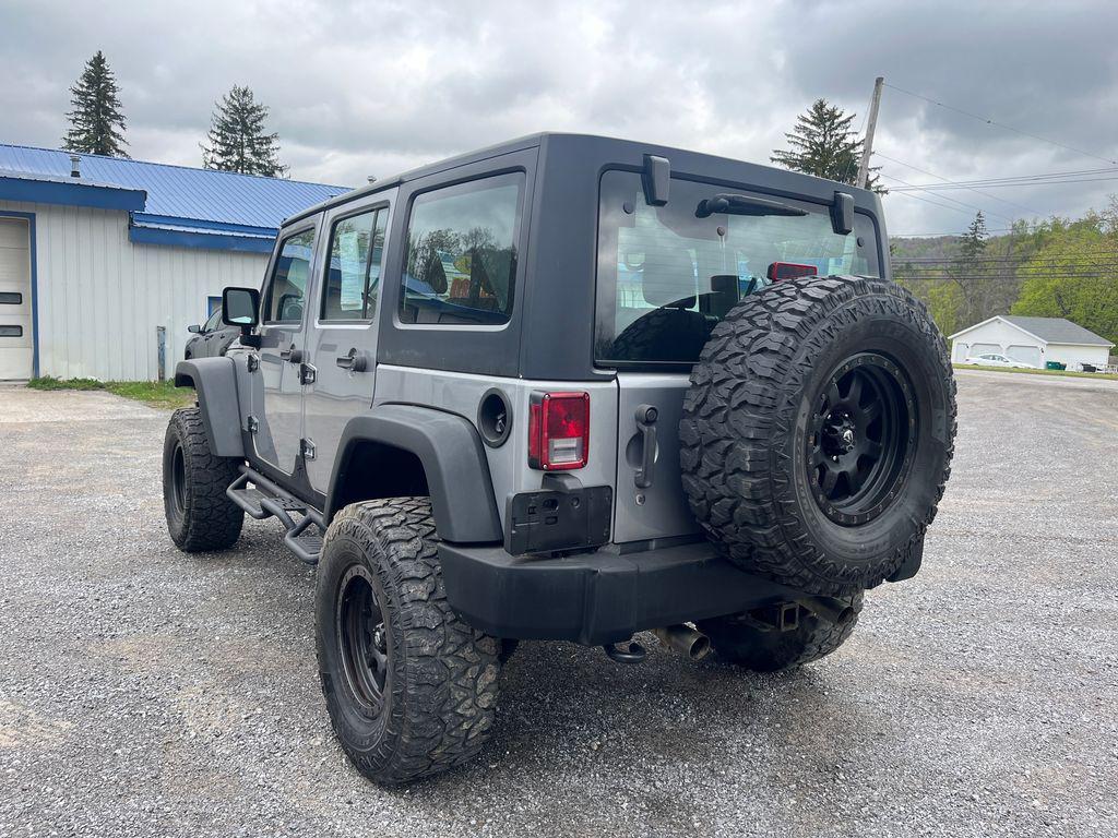 used 2014 Jeep Wrangler Unlimited car, priced at $21,677