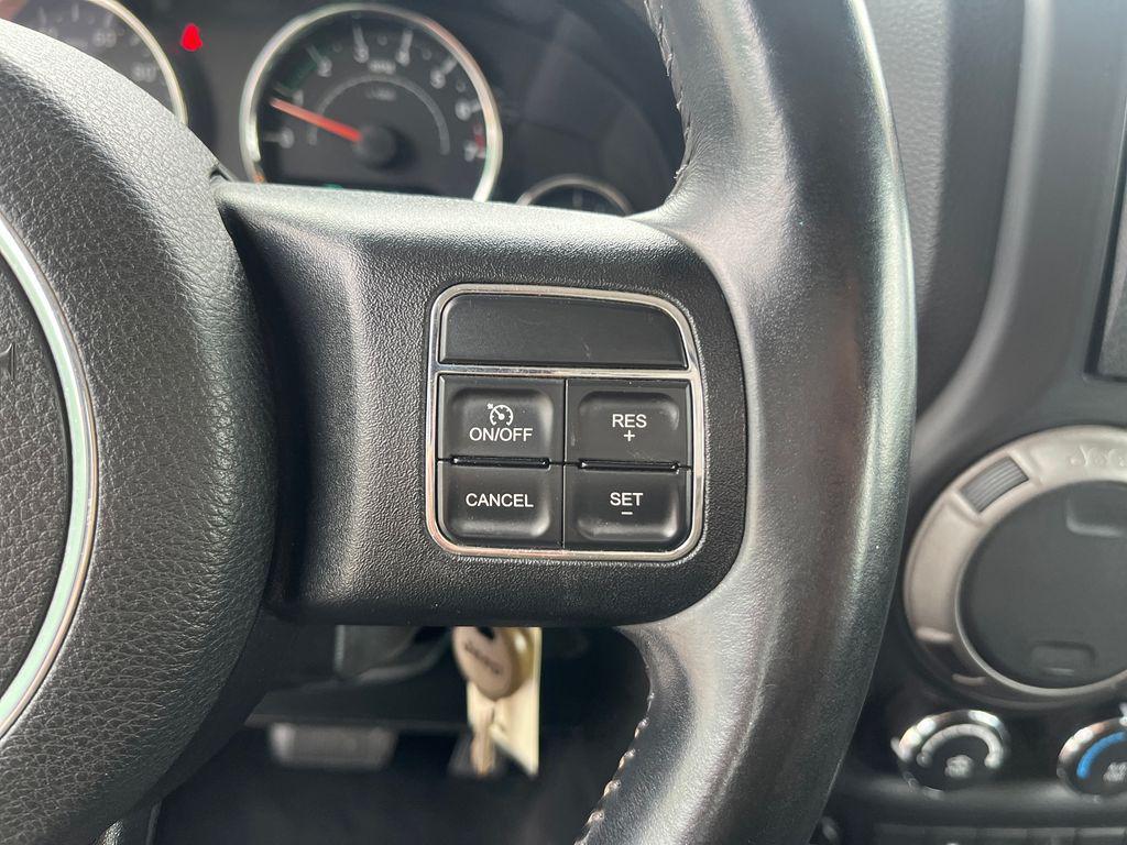 used 2014 Jeep Wrangler Unlimited car, priced at $21,677