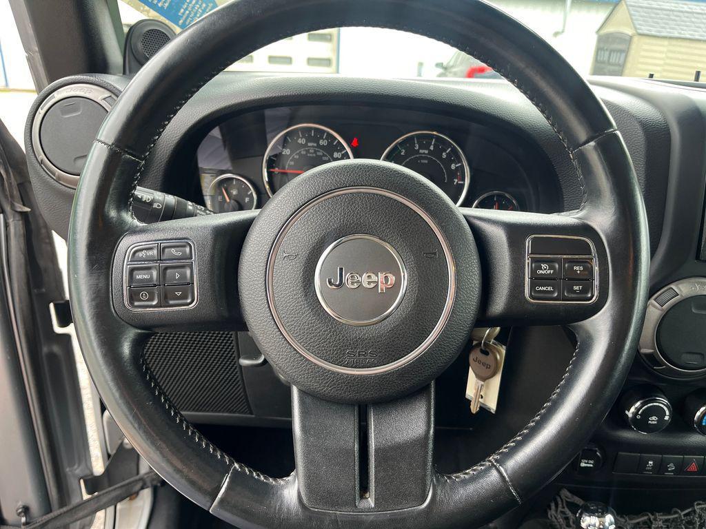 used 2014 Jeep Wrangler Unlimited car, priced at $21,677