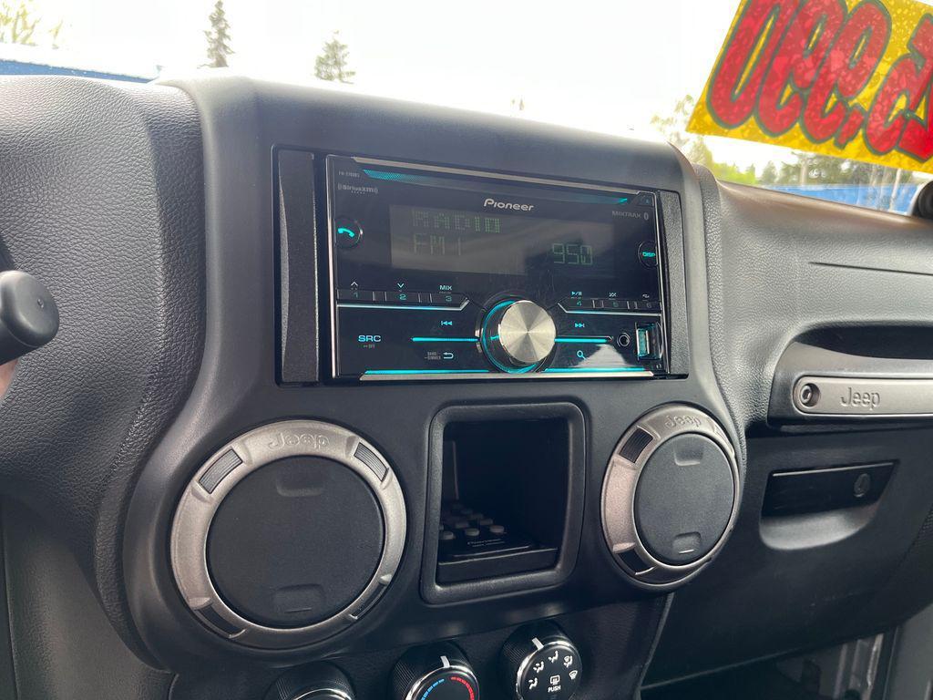 used 2014 Jeep Wrangler Unlimited car, priced at $21,677