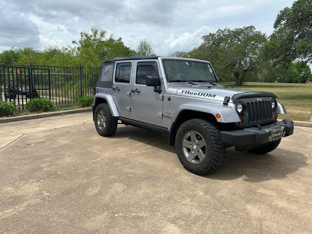 used 2013 Jeep Wrangler Unlimited car, priced at $20,222