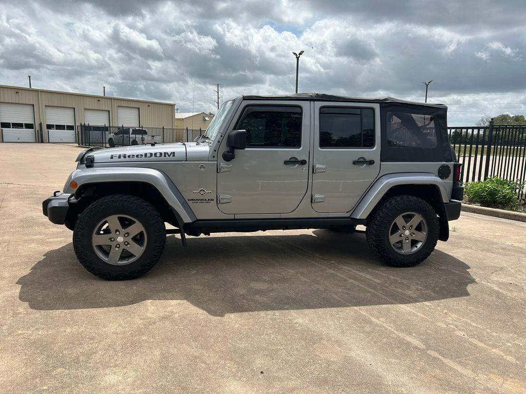 used 2013 Jeep Wrangler Unlimited car, priced at $20,222