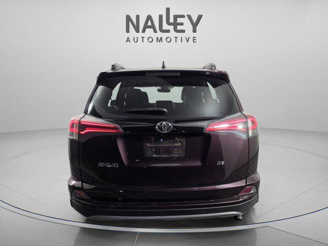 used 2018 Toyota RAV4 car, priced at $17,990