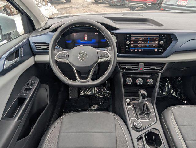 used 2023 Volkswagen Taos car, priced at $20,203
