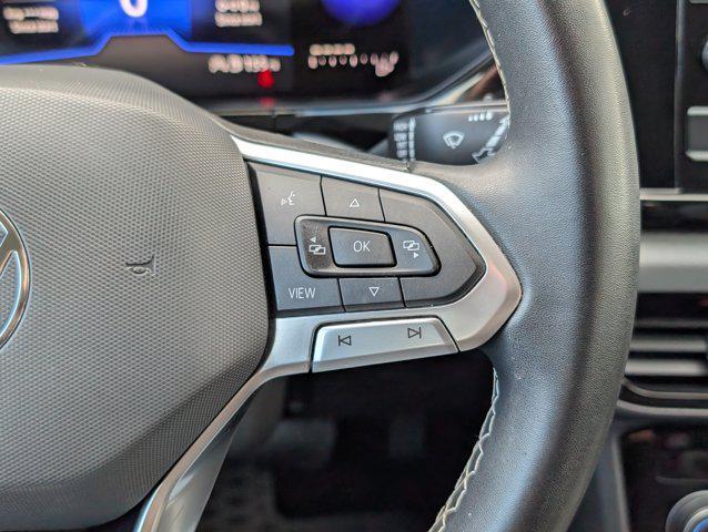 used 2023 Volkswagen Taos car, priced at $15,703