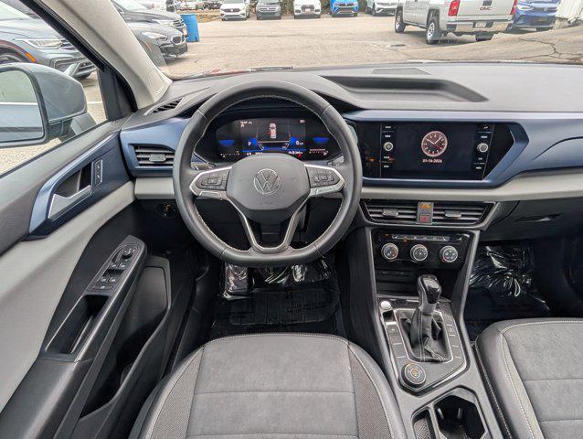 used 2023 Volkswagen Taos car, priced at $18,802