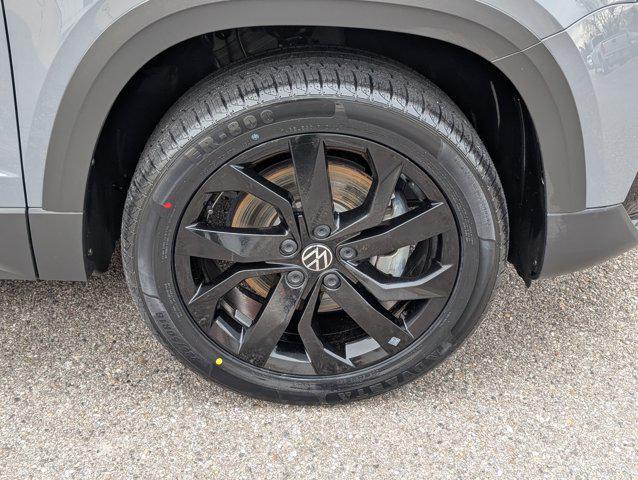 used 2023 Volkswagen Taos car, priced at $18,802