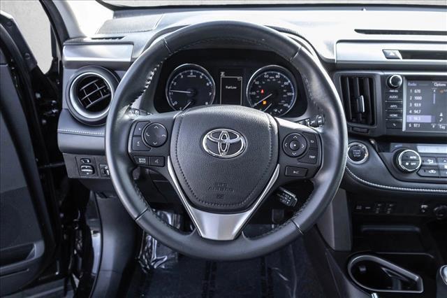 used 2018 Toyota RAV4 car, priced at $24,152