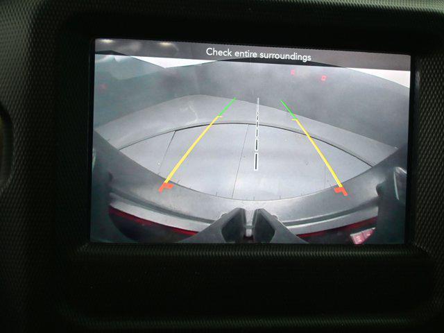 used 2023 Jeep Wrangler car, priced at $27,392