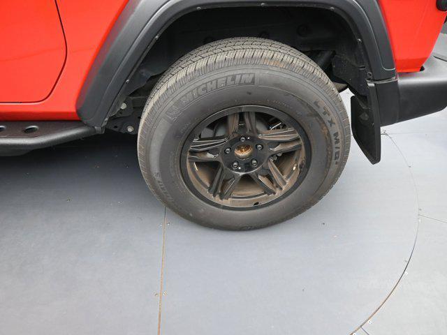 used 2023 Jeep Wrangler car, priced at $27,392
