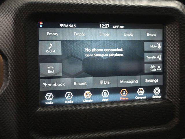 used 2023 Jeep Wrangler car, priced at $27,392