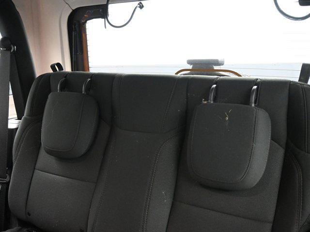 used 2023 Jeep Wrangler car, priced at $27,392