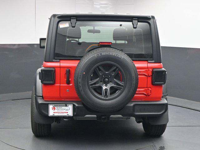used 2023 Jeep Wrangler car, priced at $27,392