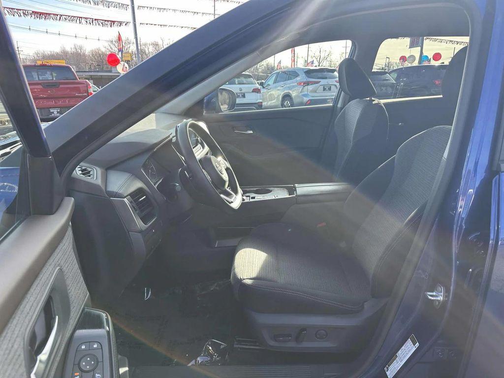 used 2023 Nissan Rogue car, priced at $15,895