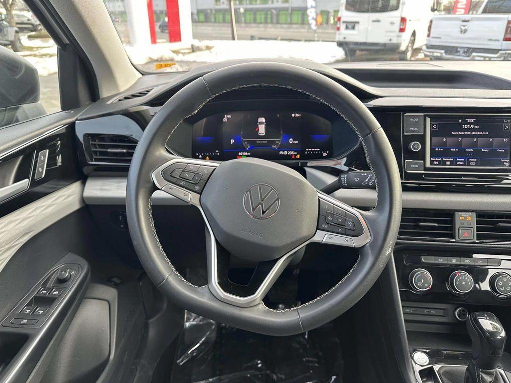 used 2023 Volkswagen Taos car, priced at $14,795
