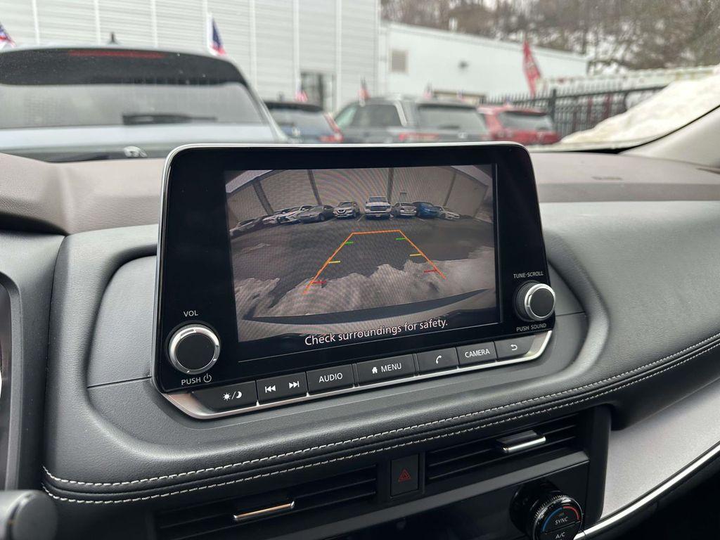 used 2023 Nissan Rogue car, priced at $16,990