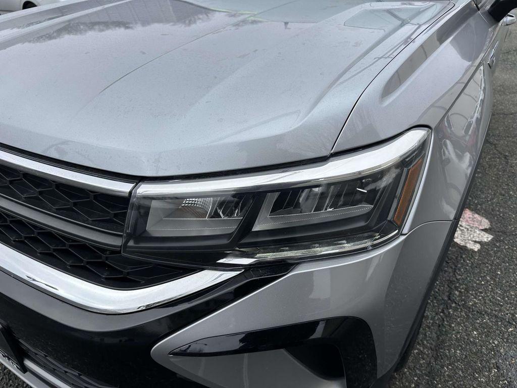 used 2024 Volkswagen Taos car, priced at $14,990