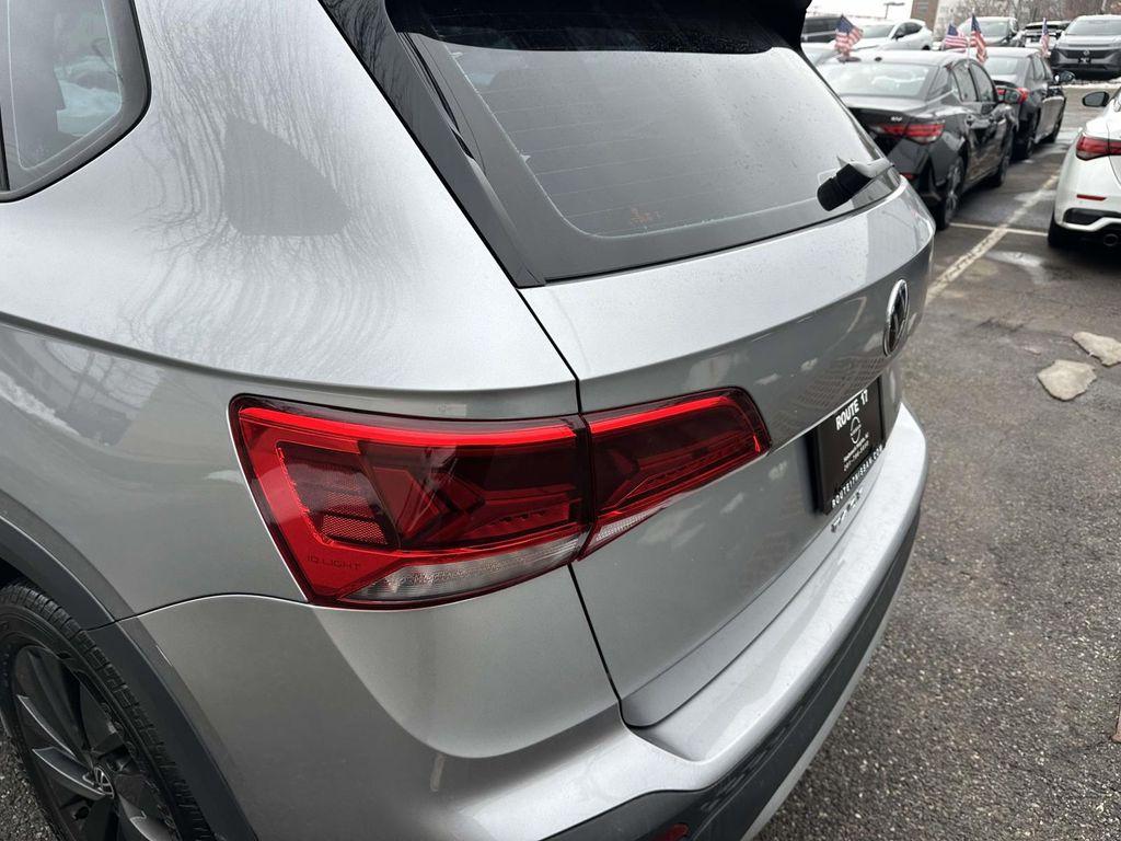 used 2024 Volkswagen Taos car, priced at $14,990