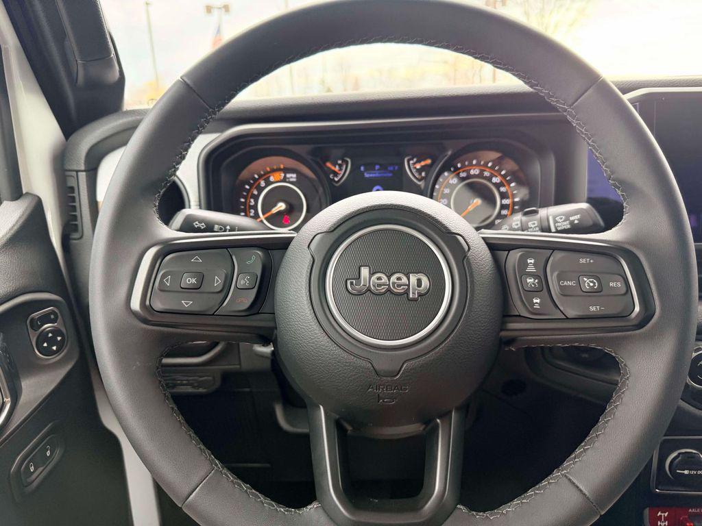 used 2025 Jeep Wrangler car, priced at $36,000