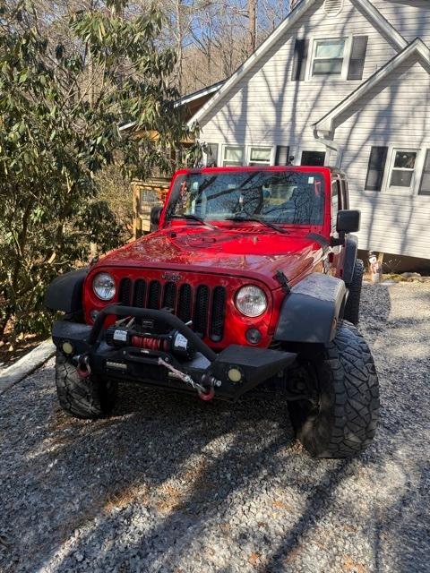 used 2017 Jeep Wrangler Unlimited car, priced at $19,354