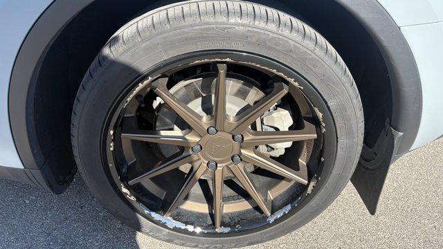 used 2023 Tesla Model Y car, priced at $28,411