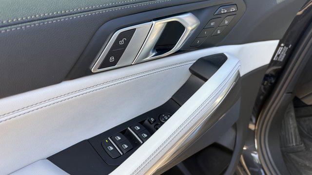 used 2023 BMW X6 car, priced at $57,584