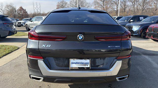 used 2023 BMW X6 car, priced at $57,584