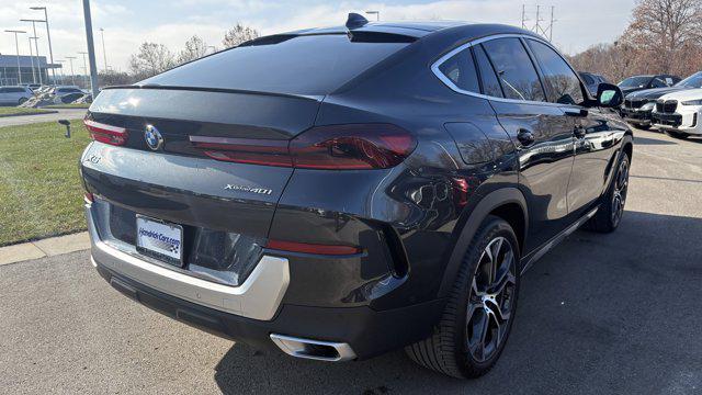 used 2023 BMW X6 car, priced at $57,584