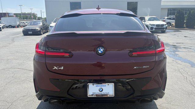 used 2023 BMW X4 car, priced at $41,764