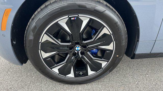 new 2026 BMW iX car, priced at $90,910