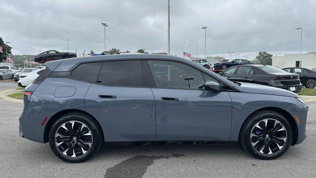 new 2026 BMW iX car, priced at $90,910