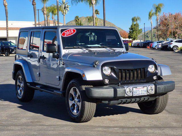 used 2018 Jeep Wrangler JK Unlimited car, priced at $21,701