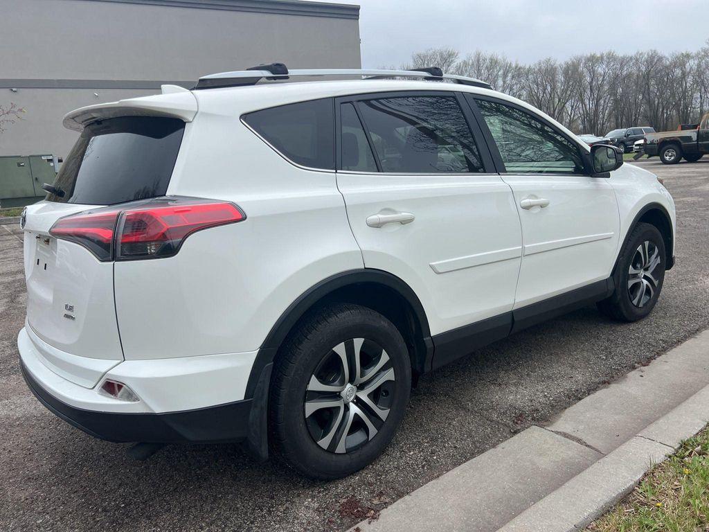 used 2018 Toyota RAV4 car, priced at $19,628