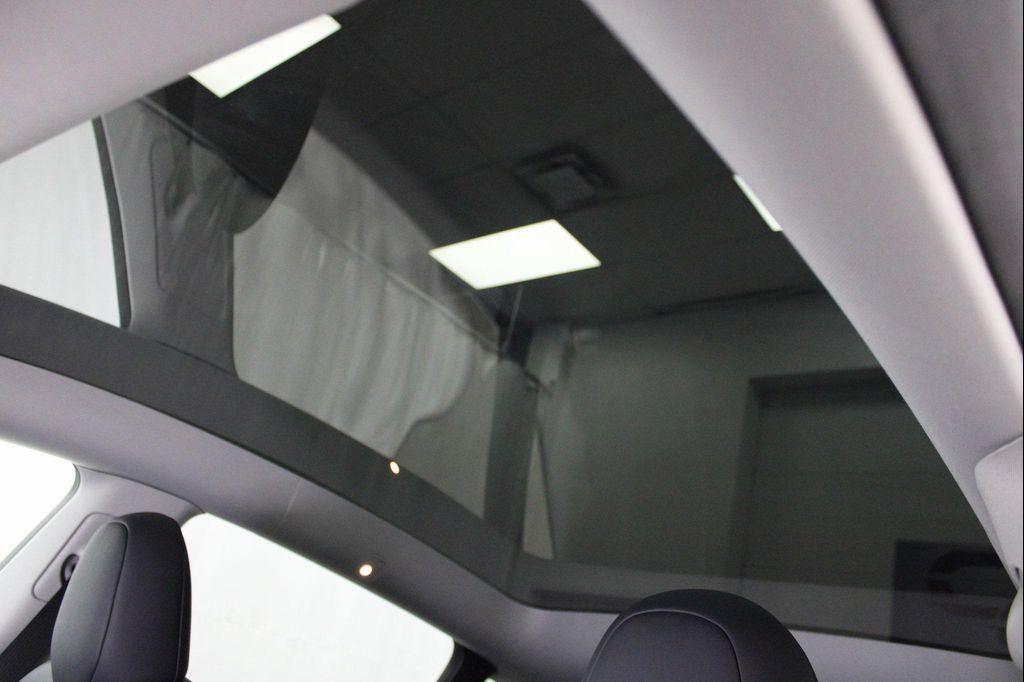 used 2025 Tesla Model Y car, priced at $39,885