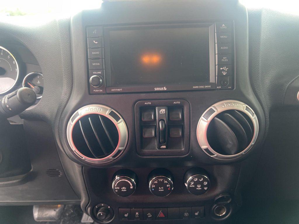 used 2015 Jeep Wrangler Unlimited car, priced at $16,653