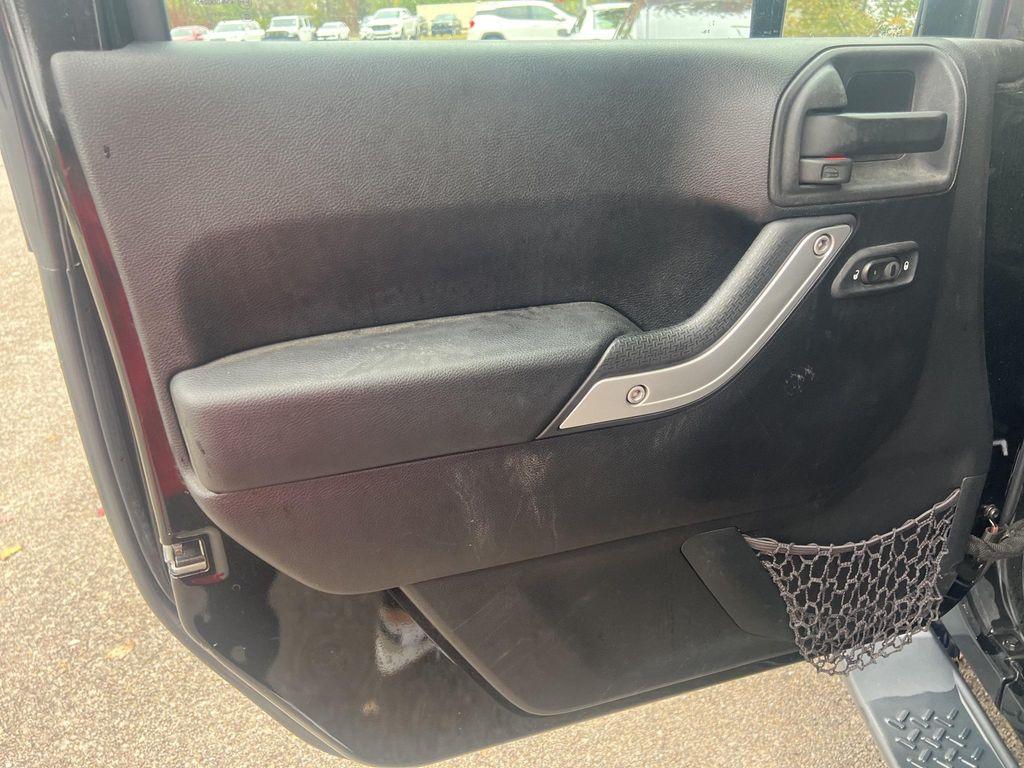 used 2015 Jeep Wrangler Unlimited car, priced at $16,653