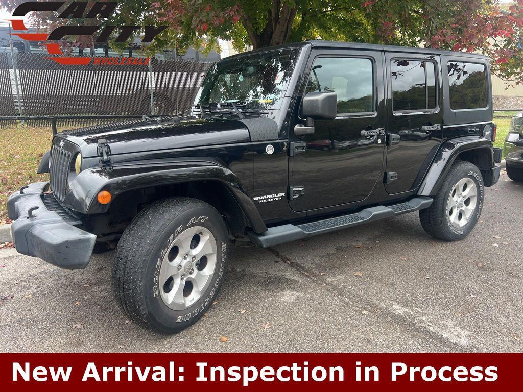used 2015 Jeep Wrangler Unlimited car, priced at $16,653