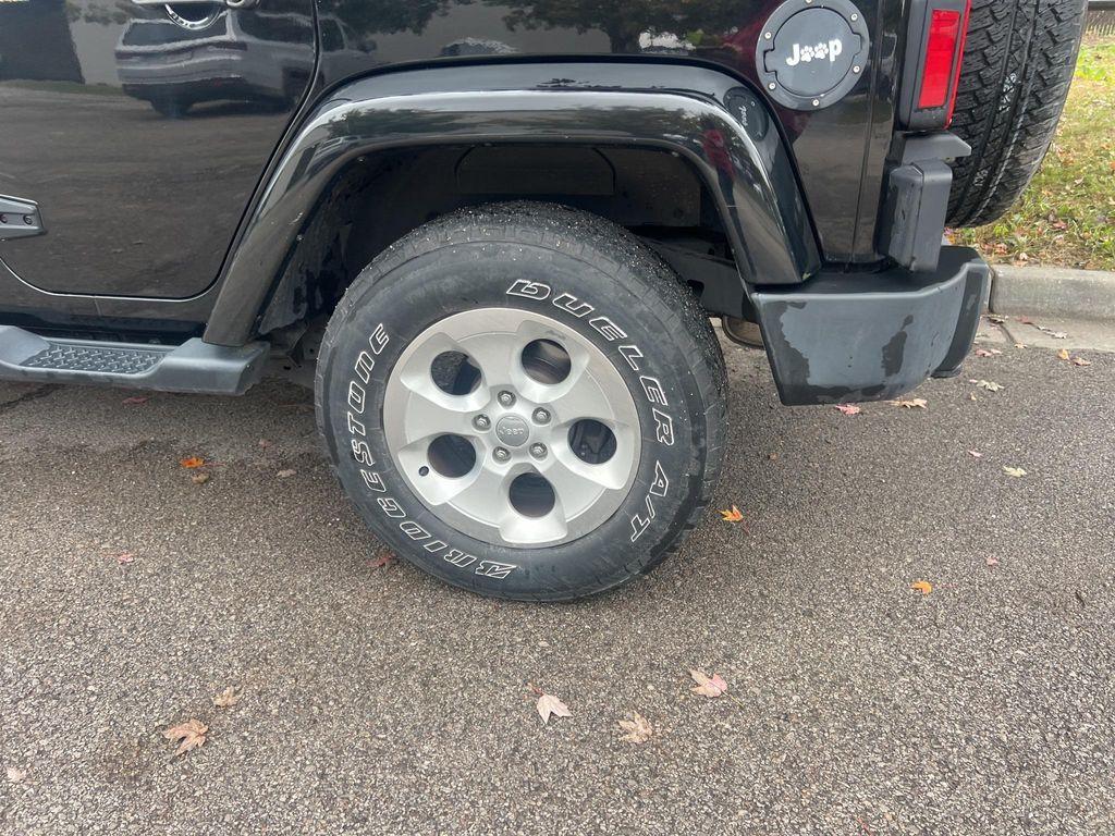 used 2015 Jeep Wrangler Unlimited car, priced at $16,653