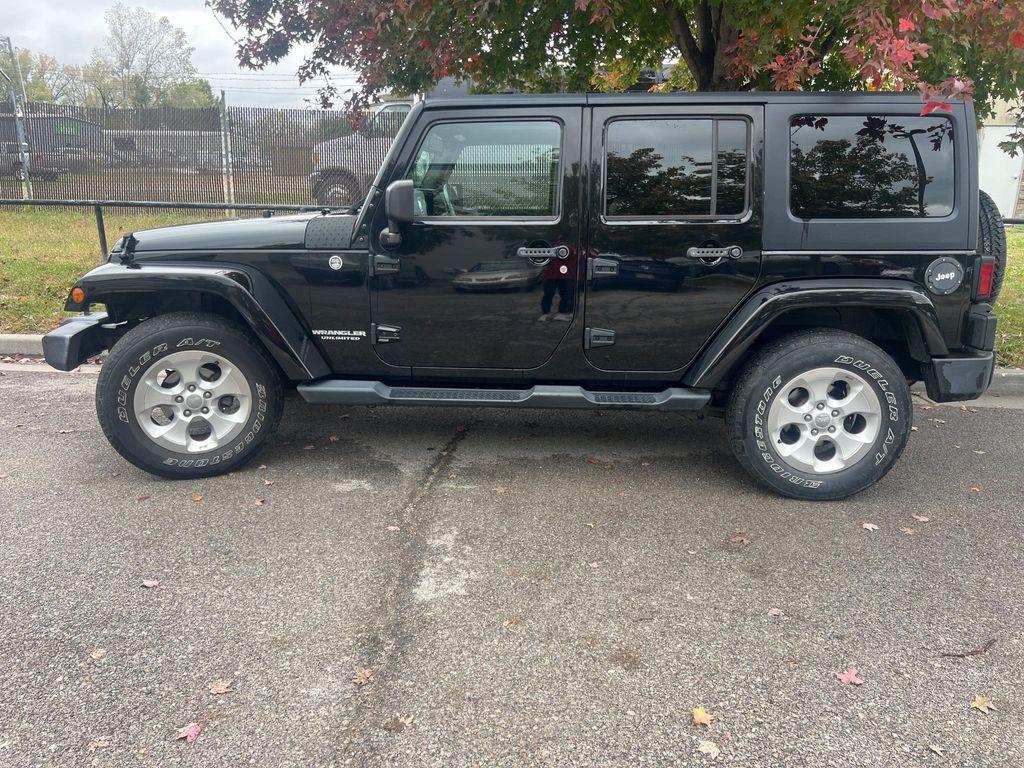 used 2015 Jeep Wrangler Unlimited car, priced at $16,653