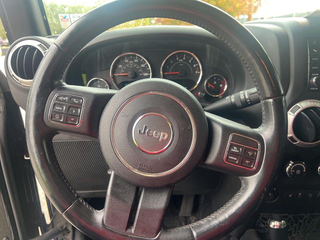 used 2015 Jeep Wrangler Unlimited car, priced at $16,653