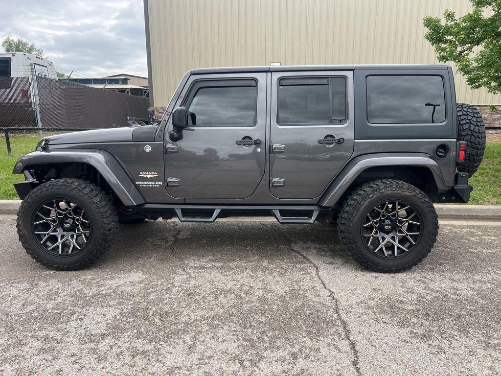 used 2014 Jeep Wrangler Unlimited car, priced at $18,817