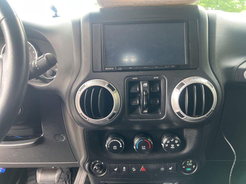 used 2014 Jeep Wrangler Unlimited car, priced at $18,817
