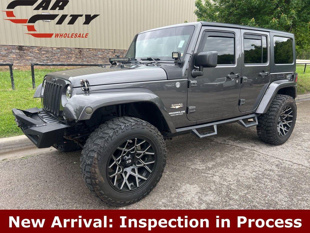used 2014 Jeep Wrangler Unlimited car, priced at $18,817