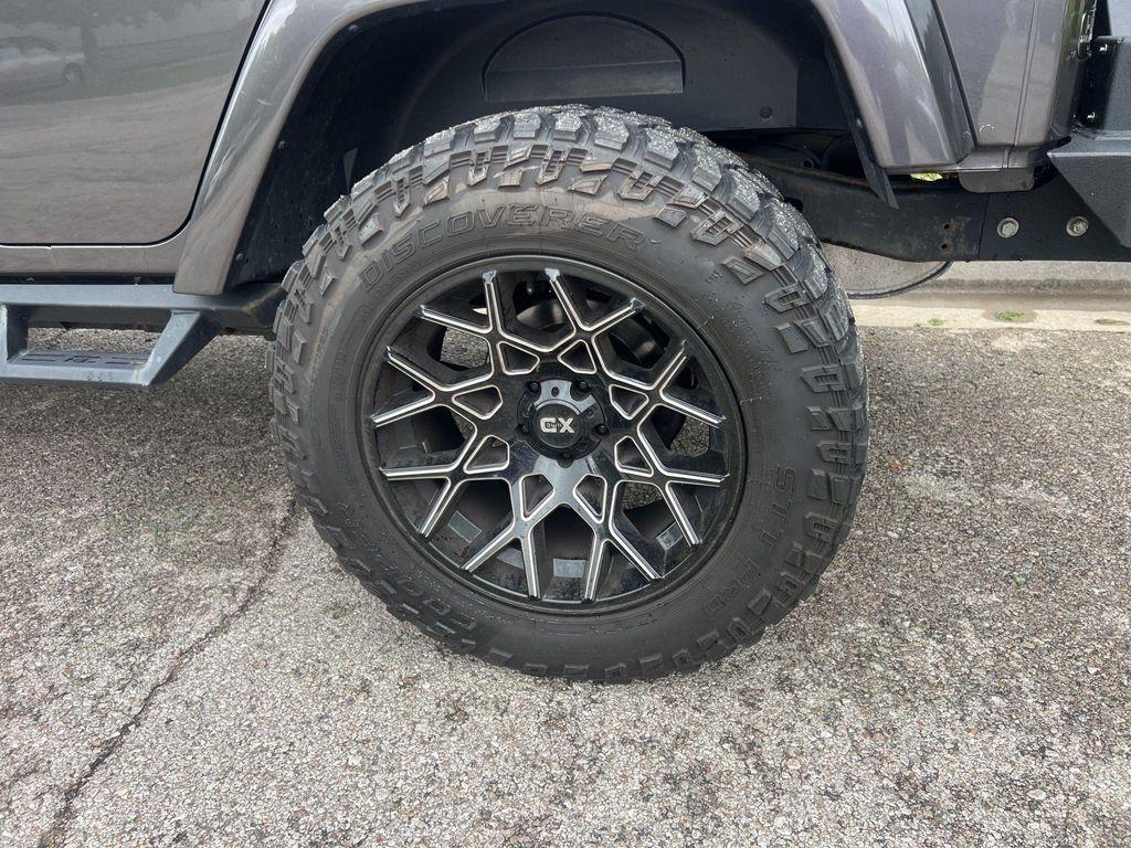 used 2014 Jeep Wrangler Unlimited car, priced at $18,817