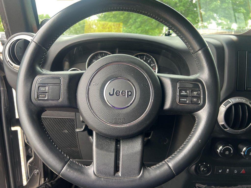 used 2014 Jeep Wrangler Unlimited car, priced at $18,817
